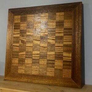 A vintage oak and walnut wooden chessboard/checkerboard